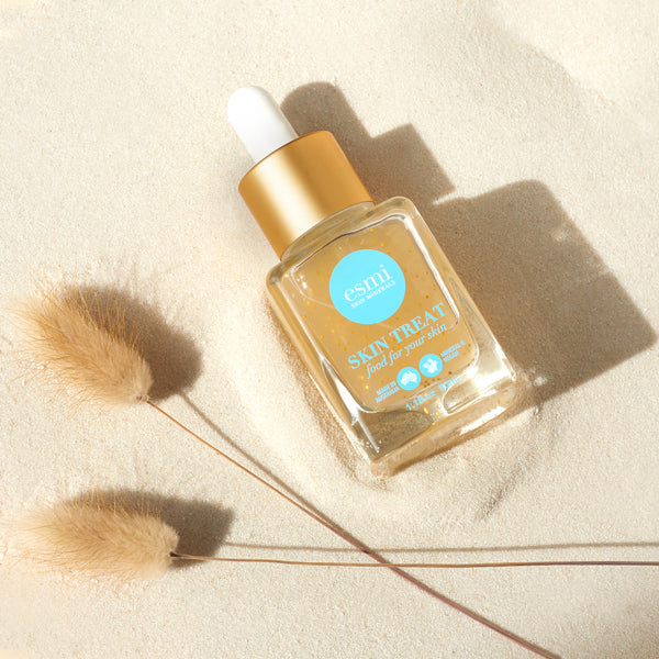 Golden Anti-Ageing Serum on sand